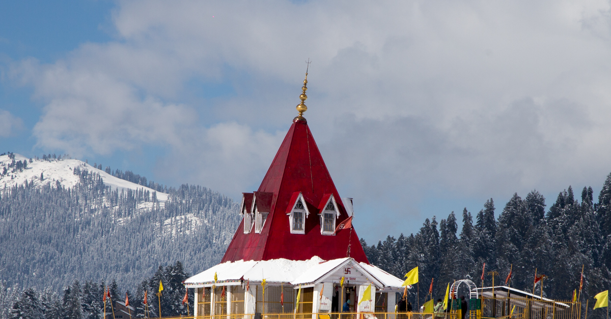  Shiva temple located at gulmarg, J&K’s beautiful structure white walls and sloping red roof.